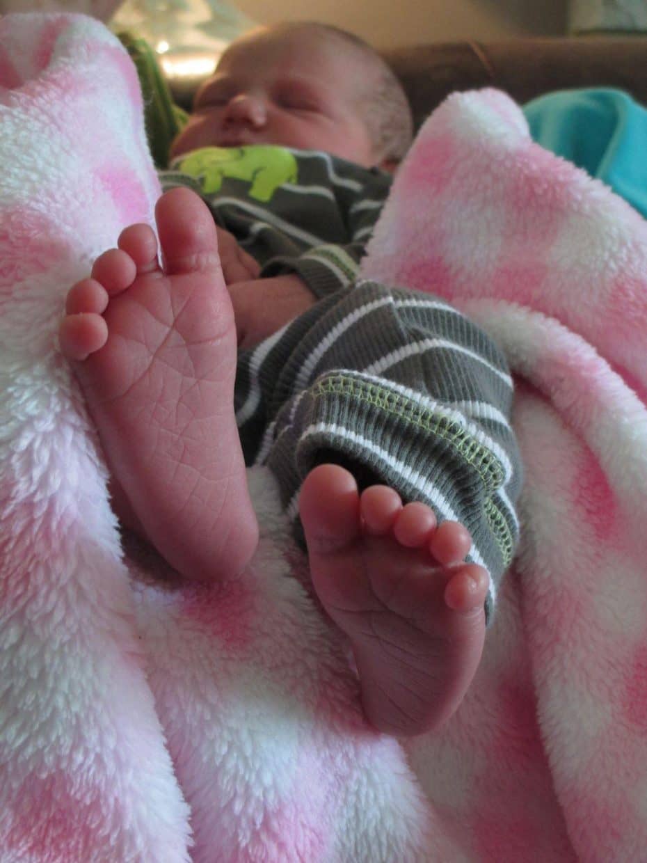 close up shot of infant feet, peacefully resting